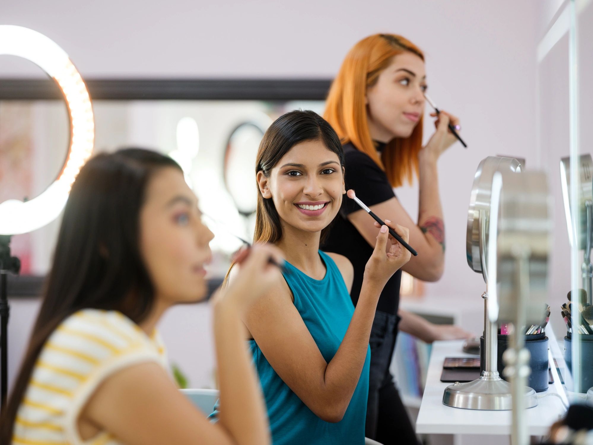 Student practicing beauty techniques in a salon environment