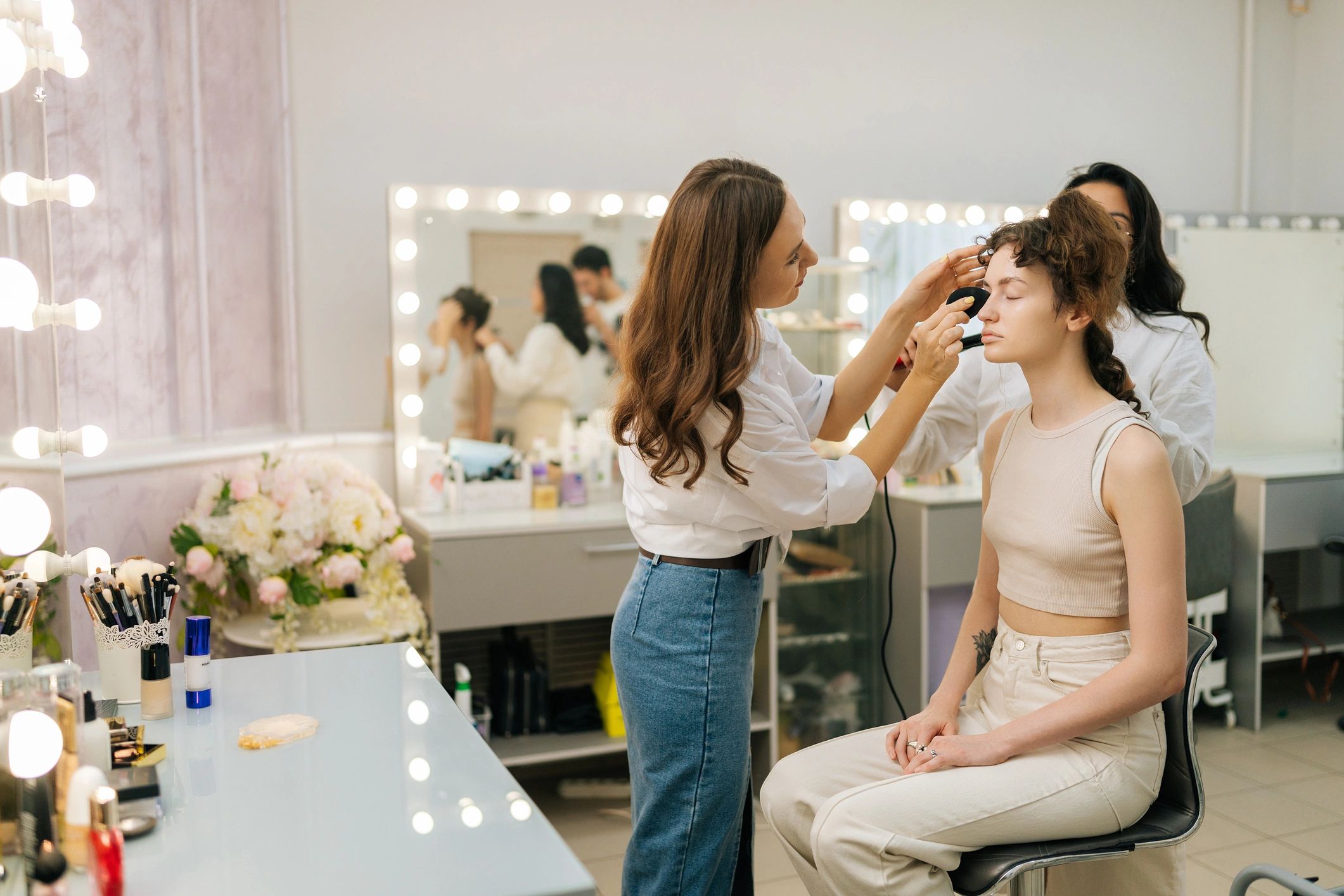 Beauty academy students in practical training session